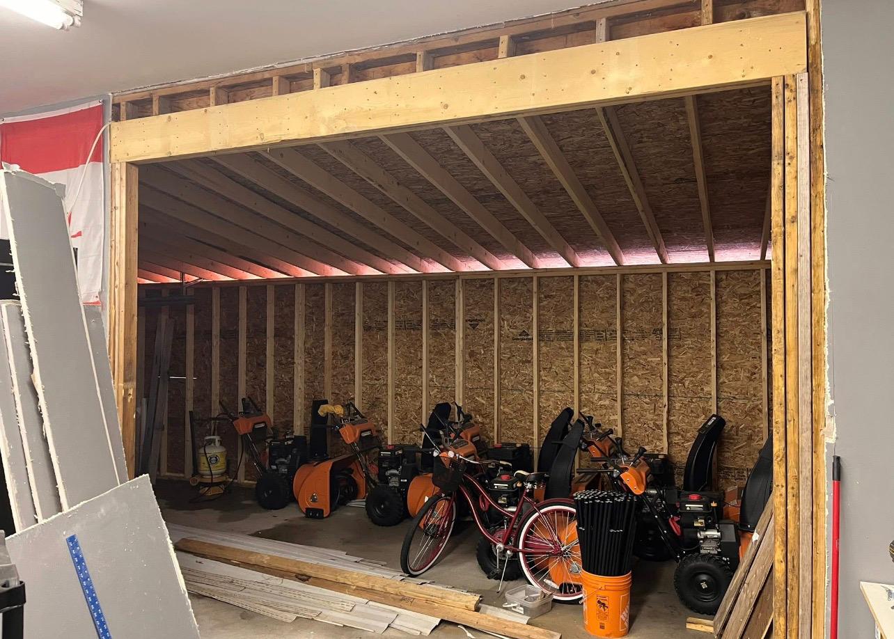 Garage addition framing with storage area by Leeonitis Contracting London Ontario