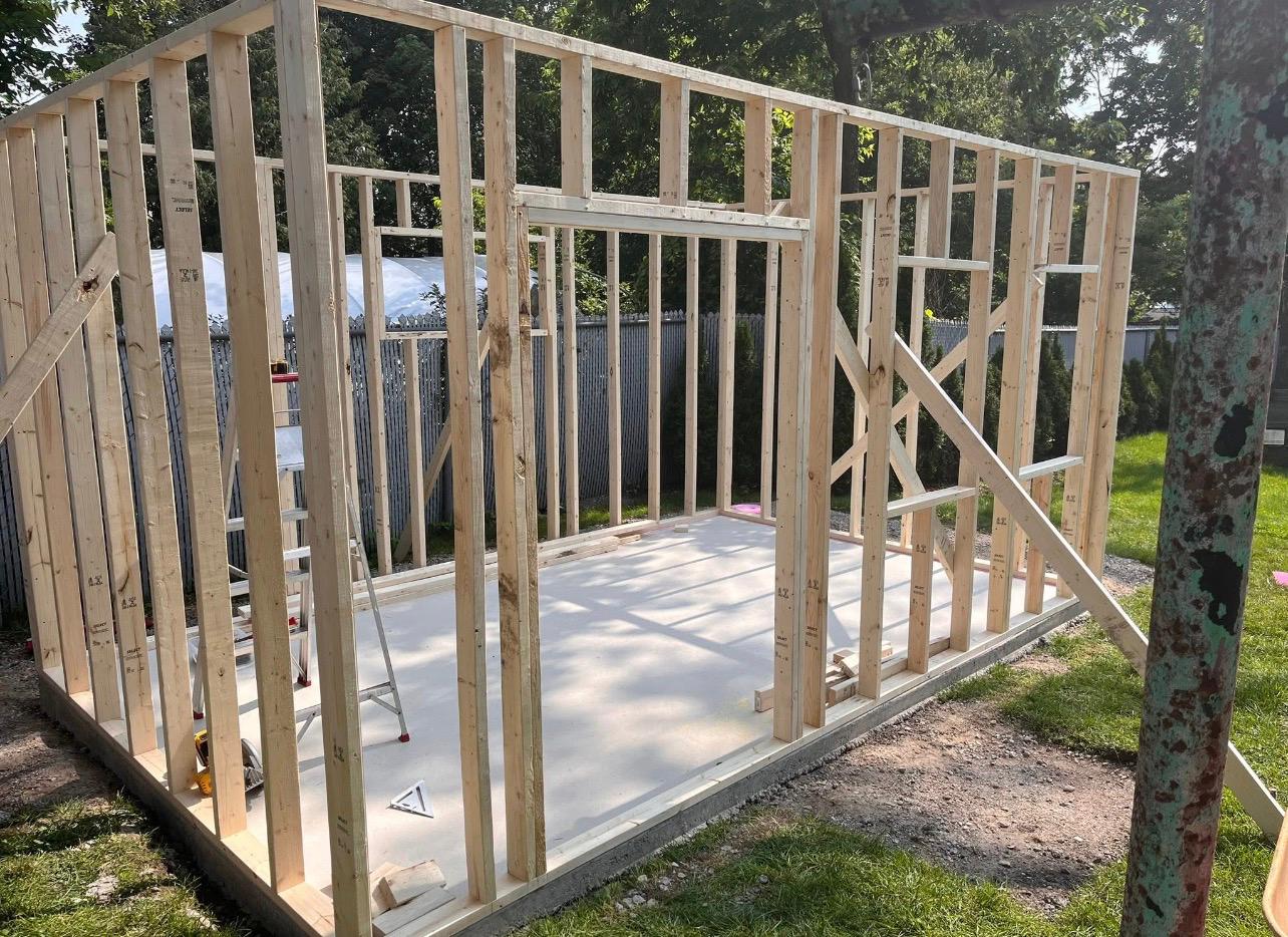 Outdoor shed structure framing in progress by Leeonitis Contracting London Ontario