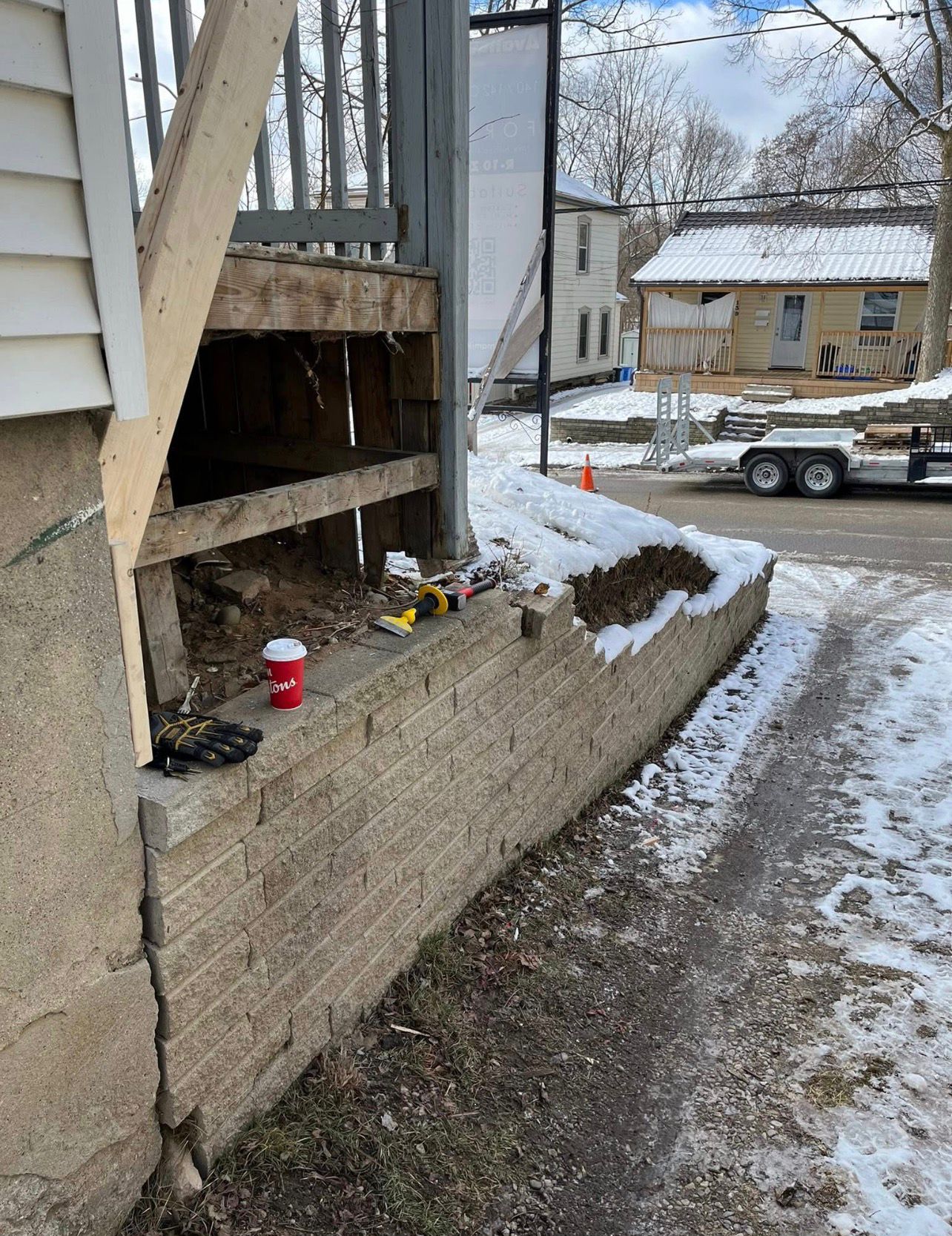 Retaining wall and porch repair in winter by Leeonitis Contracting London Ontario